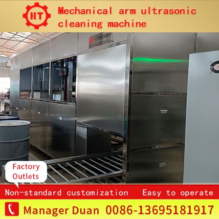Fully automatic ultrasonic cleaning machine with a new material degreasing robotic arm