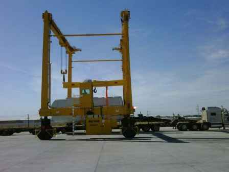 Mobile gantry crane on tyres (two units) to handle and transport precast concrete beams and pillars