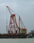 The safety monitoring and management system of the mast crane is applicable to the unloading of materials at the port of Kaidel