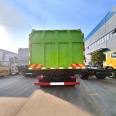 Dongfeng Jingcheng's large rear eight wheel docking garbage truck lifts and unloads garbage through a hydraulic cylinder, and the rear door is hydraulically opened