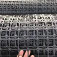 Using high tensile strength plastic geogrids for roadbed to increase the bearing capacity of the roadbed through biaxial stretching