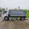 Multi functional 4-way compression Garbage truck delivered to the door by garbage extrusion truck at the airport