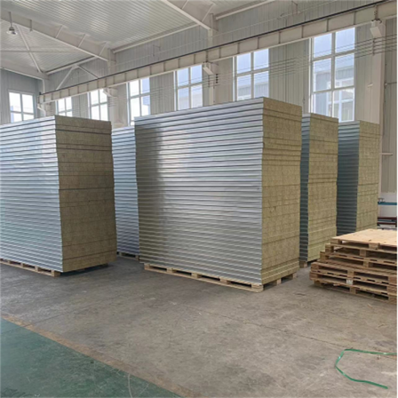 Processing of colored steel tile insulation composite roof with rock wool sandwich board on the factory roof