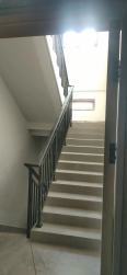 Iron staircase handrail, light luxury indoor villa, household engineering, steel and wood stairs