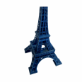 Professional personnel produce blue Eiffel Tower with quality assurance services in place