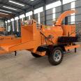 Small branch crusher, dual use of oil and electricity, for green pruning and branch breaking. Locomotive mounted wood log crusher, widely advanced