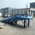 Yingda flip board climbing vehicle mobile unloading and loading bridge container loading and unloading platform