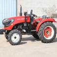 Wholesale of agricultural four wheeled tractors with high flower tires for paddy fields