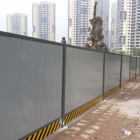 Green grass, colored steel fence, construction site road, colored steel tile baffle, spring rain