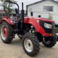 Greenhouse King 504 tractor, four wheel drive drag plow,