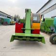 Cattle manure water cleaning and sweeping vehicle for cattle manure in the breeding farm. A 25 horsepower three wheeled manure transport vehicle is used to shovel cow manure