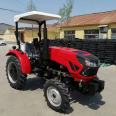 Medium size 40 50 horsepower agricultural four wheel tractor with strong pressure lift can be equipped with a sunshade