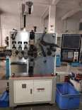 Multi axis and multifunctional wire forming machine, CNC camless spring machine