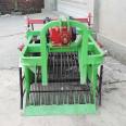 A machine for harvesting peanuts. A four wheel tractor with rear output transmission screen type fruit harvester