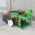 A machine for harvesting peanuts. A four wheel tractor with rear output transmission screen type fruit harvester