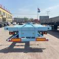 Frame semi-trailer 13.95 meter container semi-trailer transport vehicle, three bridge sea freight box carrier vehicle