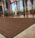 Commercial floor mats can be customized with tire pattern carpets. The hotel entrance anti-skid mat logo is the same as Wanda Mall