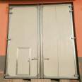 Color steel plate industrial flat door, manual and electric opening, good insulation and timely delivery