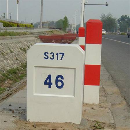 There are cable marker piles and cable pipeline marker piles under the highway signboard