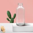Human glass transparent beverage glass bottles, fruit and vegetable juice glass bottles support customized logos