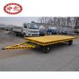 Application for adding mechanical cargo handling tools to flatbed trailers Factory transfer flatbed trucks