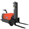 Station driven fully electric forklift for handling and stacking, hand supported vertical stacker