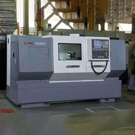 The manufacturer provides CAK4085 CNC lathe with automatic shift horizontal open-loop control electric metal cutting
