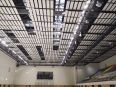 Supply of hexagonal shaped fiberglass shaped panels for suspended ceilings and sound-absorbing pendants in concert halls