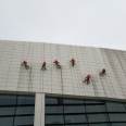 The exterior walls of the building are cleared and cleaned. The glass exterior walls are clean, bright, and free of watermarks