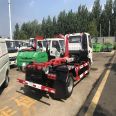 Dongfeng Xiaokang 3-way carriage detachable hook arm garbage truck with blue license plate can enter the underground garage, with one vehicle equipped with multiple containers