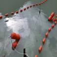 Warning buoy for intercepting water plants on the lake surface and floating discharge for intercepting sewage vessels in river tributaries