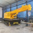 Construction site dedicated crawler crane with four hydraulic support legs, steel crawler hook machine, chassis modification crane