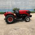 Wholesale of agricultural four wheeled tractors with high flower tires for paddy fields