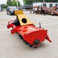 Four wheeled tractor with rotary tiller, agricultural land plowing and loosening machine, field breaking machine