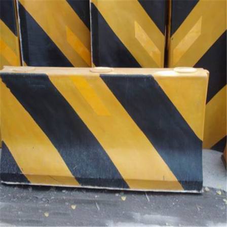 Cement isolation pier, middle guardrail, parking lot, yellow and black warning pier, concrete enclosure pier