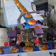 Fully automatic doughnut bread and pastry packaging machine multifunctional food packaging machinery