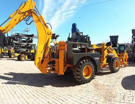 Two busy loaders, excavators, front shovels, back shovels, one machine for multi-purpose earthwork construction, road and ditch construction