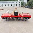 Four wheeled tractor with rotary tiller, agricultural land plowing and loosening machine, field breaking machine