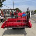 Crawler type wheat harvester with built-in granary in mountainous paddy fields. Rice harvester with small plots for easy use