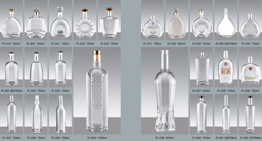 Alibaba Premium Custom Design Empty Clear Crystal Cylinder Spirit Glass bottle Vodka 700ml 750ml Vodka Glass Bottles for Liquor