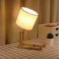 Solid Wood Humanoid Creative Fashion Table Lamp Study Bedroom Bedside Wooden Robot Folding Table Lamp